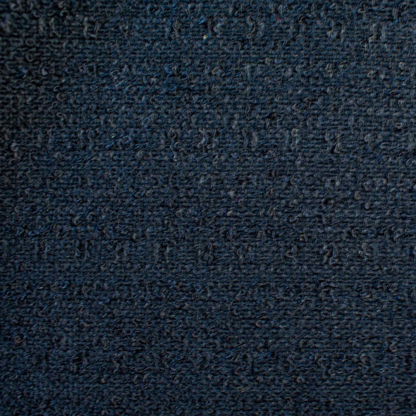 Couture Designer Flat Boucle Wool Blend fabric in black. Perfect for a French Jacket! - close up of fabric weave