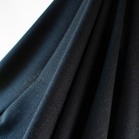 Couture Designer Flat Boucle Wool blend fabric in black. Perfect for a French Jacket! - lengthwise fabric drape
