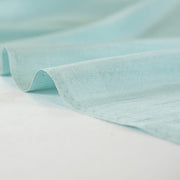 Elegant and dreamy this crystal blue, light weight, silk shantung from a Beverly Hills Couture house is lustrous with a soft slightly textured hand. The suppleness of this silk just feels good against your skin and would make an elegant dress, skirt, gown, suit or top. Image of selvedge.